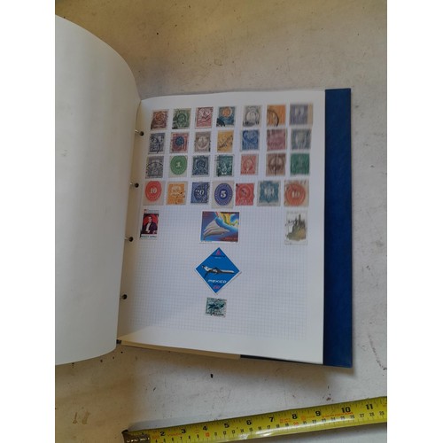 127 - Empty SG Windsor album and album of Stamps of the world mainly offered used, US interest