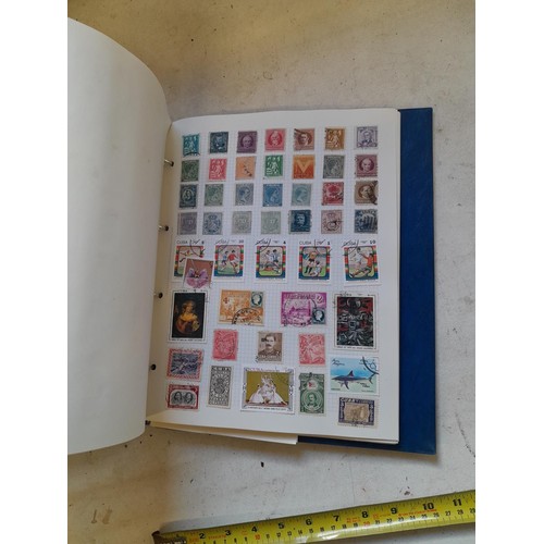 127 - Empty SG Windsor album and album of Stamps of the world mainly offered used, US interest