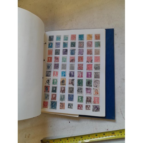 127 - Empty SG Windsor album and album of Stamps of the world mainly offered used, US interest