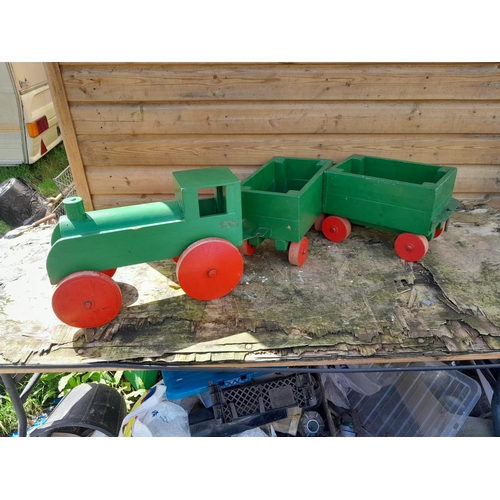 128 - Vintage painted childs pull along / sit on train with two rolling stock