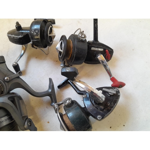 140 - Assorted fishing reels and used tackle