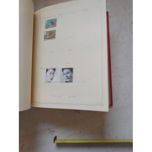 141 - 2 x Simplex stamps albums : stamps date range from Queen Victorian to heavy in QEII era