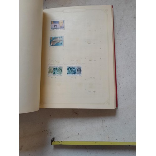 141 - 2 x Simplex stamps albums : stamps date range from Queen Victorian to heavy in QEII era