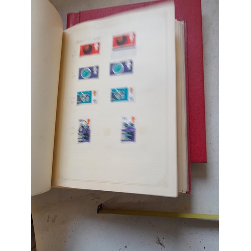 141 - 2 x Simplex stamps albums : stamps date range from Queen Victorian to heavy in QEII era