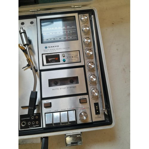 154 - Vintage Sanyo Solid State portable stereo centre, mains or battery operated no guarentees implied or... 
