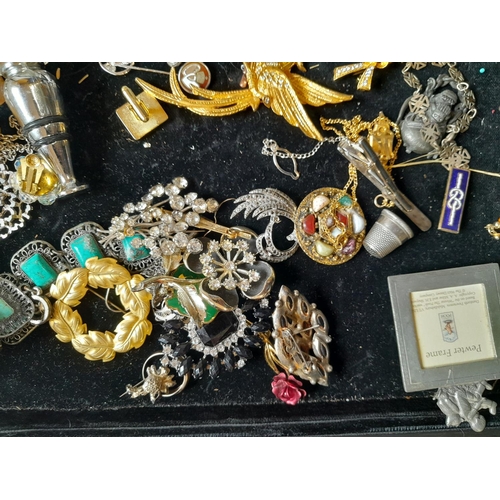 174 - Assorted costume jewellery, miniature photograph frames etc.