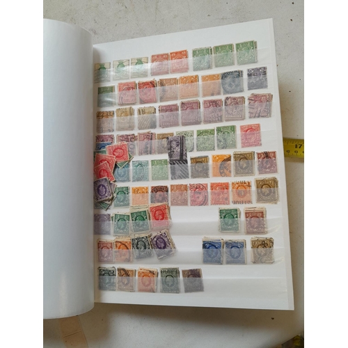 179 - Stamps in a stock book, Edward - QEII mounted mint and used