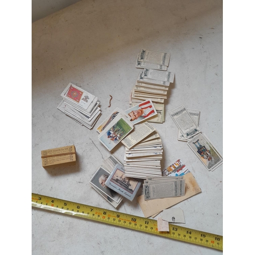 180 - Unused bus tickets and loose cigarette cards