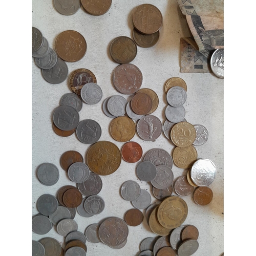 254 - Coins and banknotes from around the world all from circ.