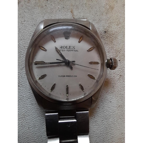 256 - Vintage Gents Rolex watch with stainless steel articulated strap with bill of sale from 1958. Rolex,... 