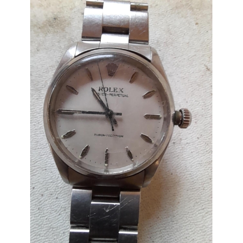 256 - Vintage Gents Rolex watch with stainless steel articulated strap with bill of sale from 1958. Rolex,... 