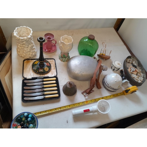 263 - Box of oddments : vintage blue and white enamel pots, marbles, pokerwork candlestick, plated ware ch... 