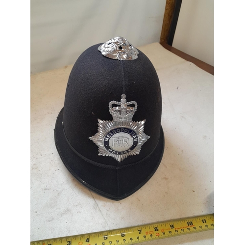 299 - Vintage Metropolitan police helmet with cap badge