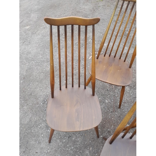 2 - Set of four Ercol Goldsmith high back dining chairs, mid colour with paper labels