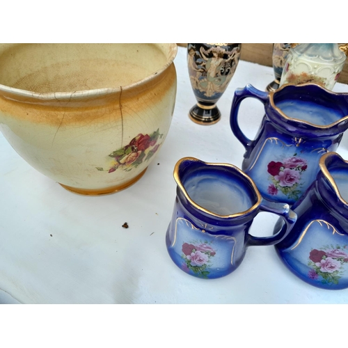 24 - Vintage style graduated jugs, damaged jardiniere etc.