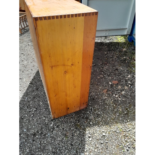 106 - Vintage pine sliding two door cupboard with recessed brass handles 110 cms x 108 cms x 44 cms