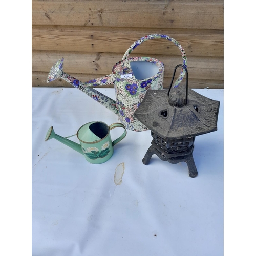 115 - Decorative watering can and cast iron light