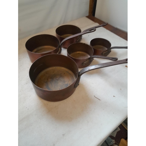 1 - Set of five vintage graduated copper saucepans