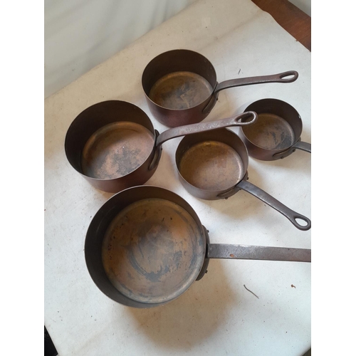 1 - Set of five vintage graduated copper saucepans