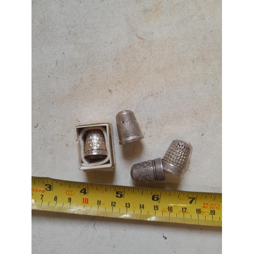 57 - 4 x silver thimbles