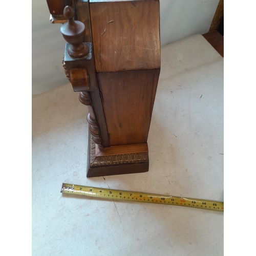 285 - Vintage  walnut case mantle clock with key and pendulum