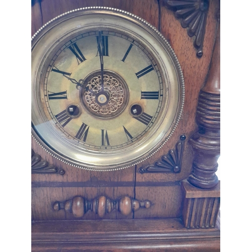 287 - Early 20th century mahogany case mantle clock with silvered dial and brass spandrels