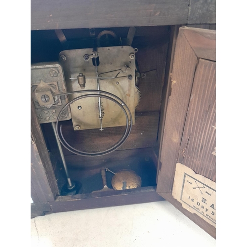 287 - Early 20th century mahogany case mantle clock with silvered dial and brass spandrels