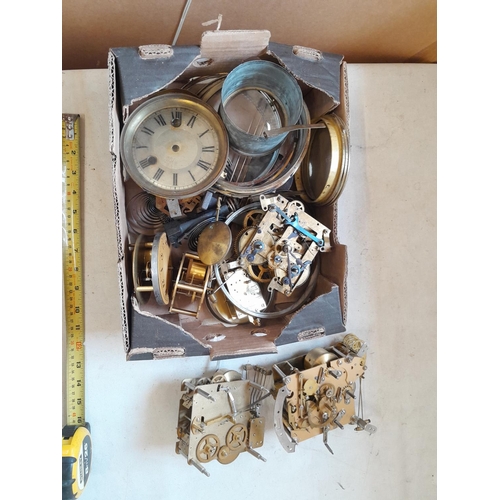 304 - Box of clock parts