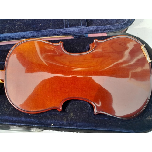 337 - Modern Stentor Students violin in case, full back with bow, body length 32 cms , overall length 57 c... 