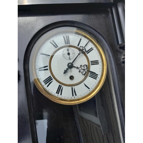 345 - Edwardian ebonized case Vienna wall clock with painted enamel dial