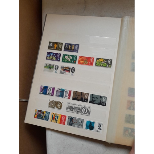 354 - Stamps of UK loosely mounted mint in album