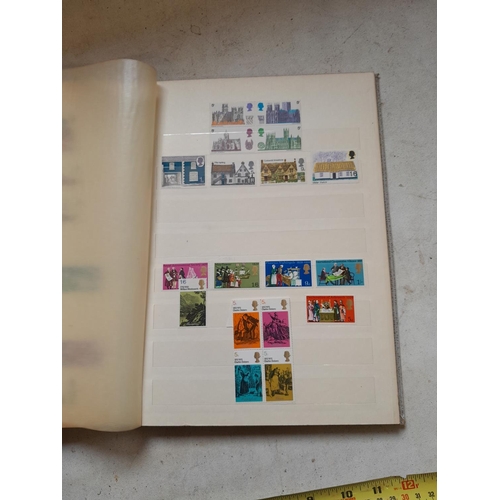 354 - Stamps of UK loosely mounted mint in album