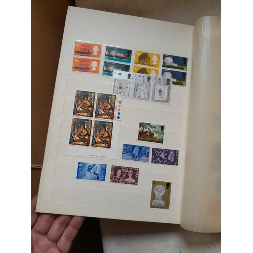 354 - Stamps of UK loosely mounted mint in album