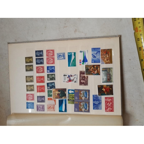 354 - Stamps of UK loosely mounted mint in album