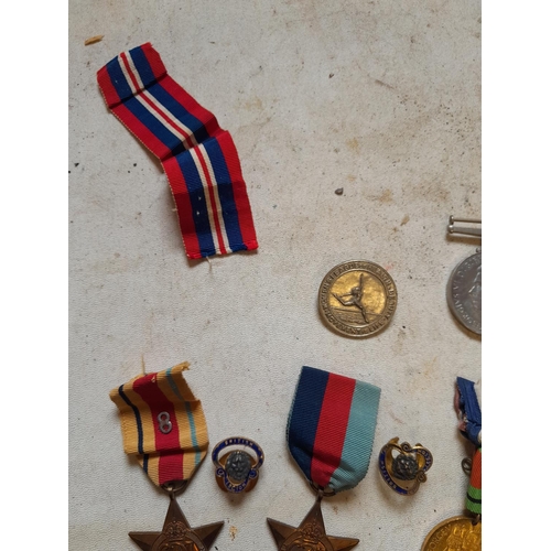 358 - Assorted World War II unnamed Medals and related items