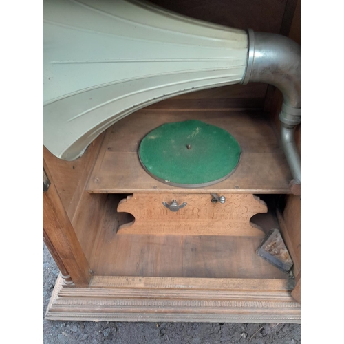 422 - Early 20th century floor standing model hand wind Pathe No 7 gramophone in wooden case, with painted... 