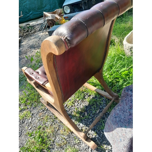 501 - 20th century leather button back, mahogany frame rocking library chair