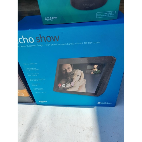 39 - Computer interest  Boxed Echo Show, Echo interactive speaker , Apeman portable video player