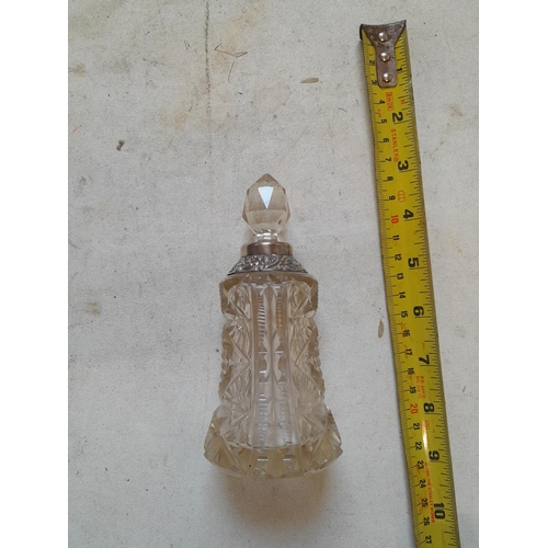 84 - Silver rimmed cut glass scent bottle