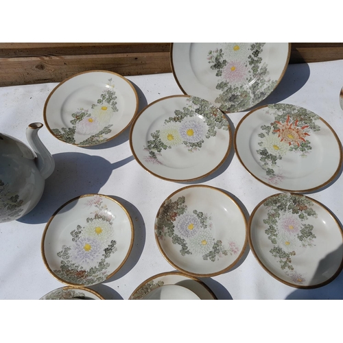 124 - 20th century Japanese eggshell porcelain tea set with signature on reverse