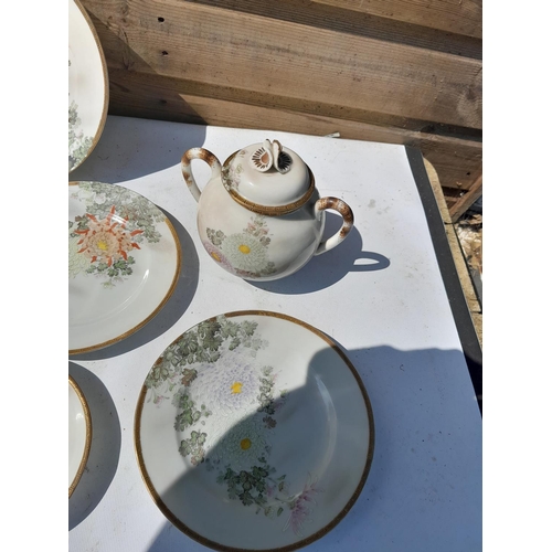 124 - 20th century Japanese eggshell porcelain tea set with signature on reverse