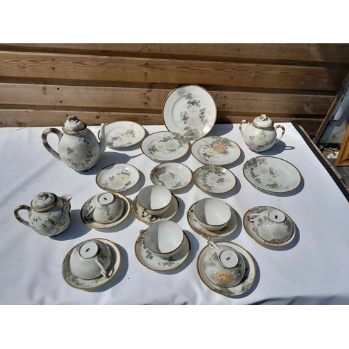 124 - 20th century Japanese eggshell porcelain tea set with signature on reverse