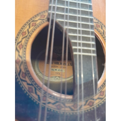 139 - Vintage Suzuki Violin Company bowl back 8 string mandolin, heavily inlaid in good order with soft ca... 