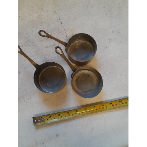 153 - Set of three small French copper sauce cooking pots