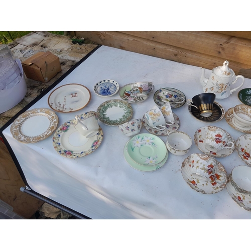 213 - Dartington glass decanter and various teacups, some mismatch