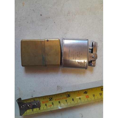 223 - Brass Zippo lighter hinge wobble and one other & 2 modern rugs