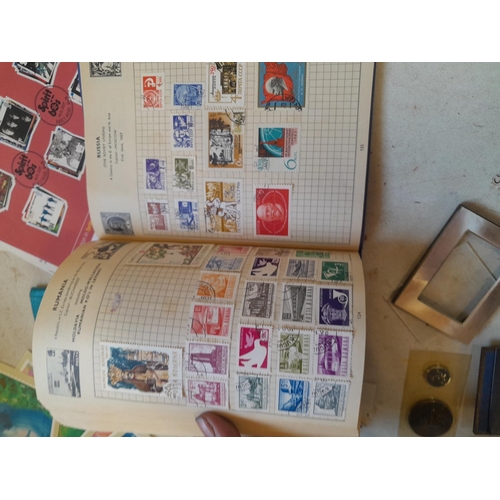 224 - Stamps as kiloware, sparsely filled schoolboy stamp album , 18 KT gold Teatro All Scala stamp, 2 x r... 