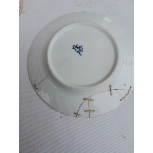 358 - Late 19th / early 20th century Dresden trio, hand decorated saucer repaired