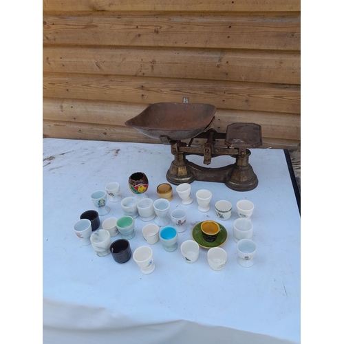 10 - Collection of vintage and later pottery and hardstone egg cups, kitchen scales