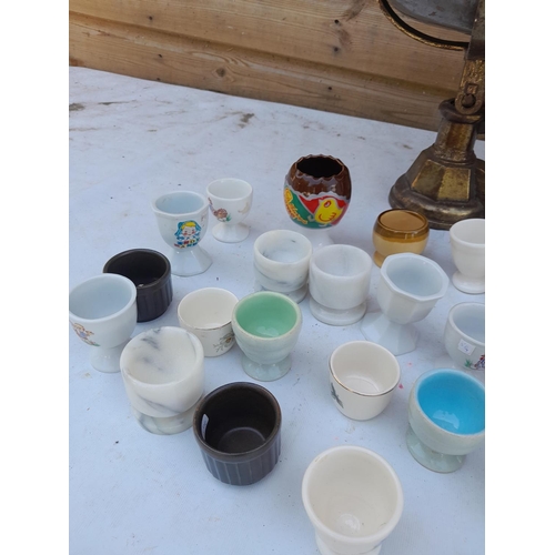 10 - Collection of vintage and later pottery and hardstone egg cups, kitchen scales